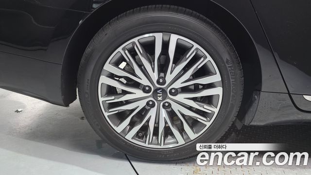 Kia K7 Premier, гибрид Signature - фото 4