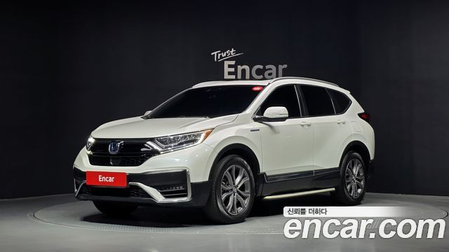 Honda CR-V 5-го поколения 2.0 Hybrid Touring 4WD - фото 0