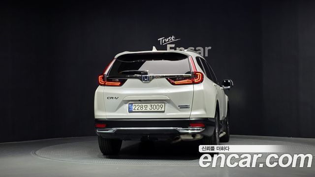 Honda CR-V 5-го поколения 2.0 Hybrid Touring 4WD - фото 3