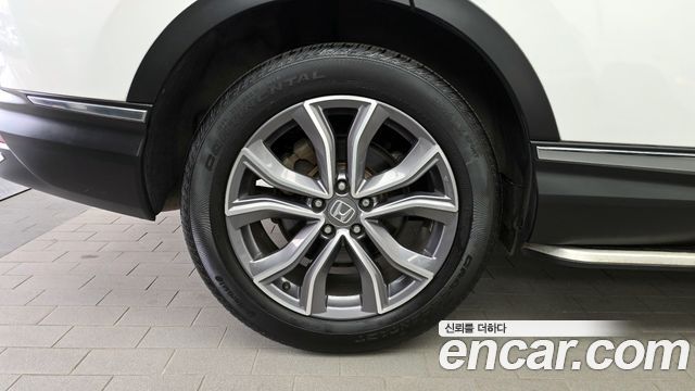 Honda CR-V 5-го поколения 2.0 Hybrid Touring 4WD - фото 4