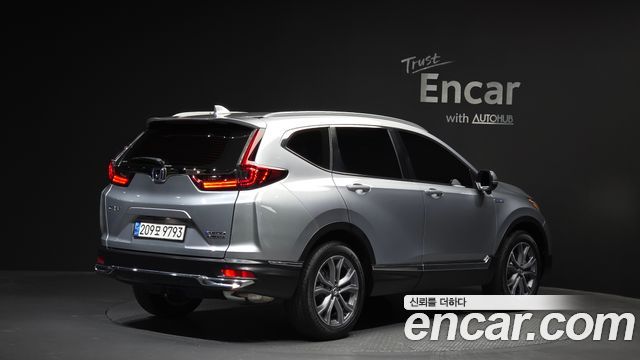Honda CR-V 5-го поколения 2.0 Hybrid Touring 4WD - фото 1