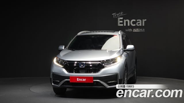 Honda CR-V 5-го поколения 2.0 Hybrid Touring 4WD - фото 2
