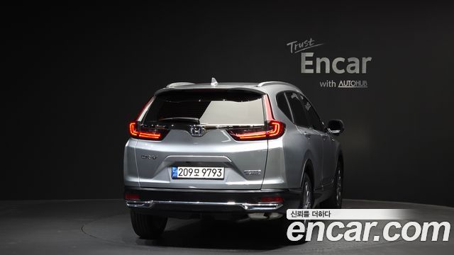 Honda CR-V 5-го поколения 2.0 Hybrid Touring 4WD - фото 3