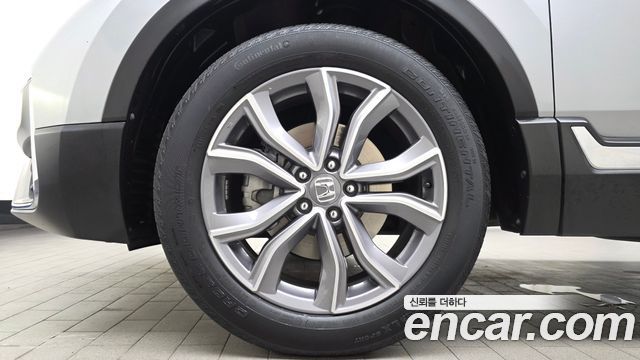 Honda CR-V 5-го поколения 2.0 Hybrid Touring 4WD - фото 4
