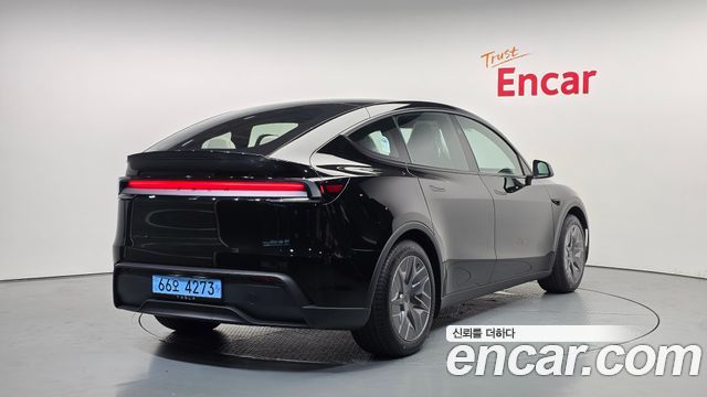 Tesla Model Y L Long Range AWD - фото 1