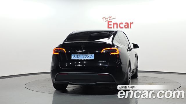 Tesla Model Y Long Range AWD - фото 3