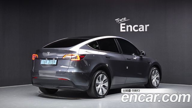 Tesla Model Y Long Range AWD - фото 1
