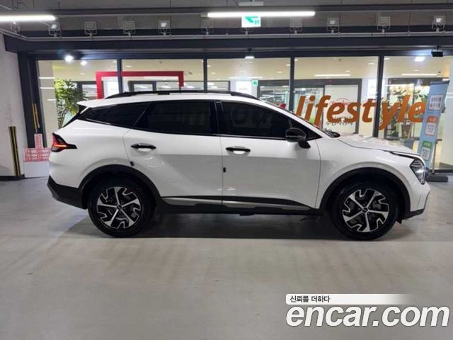 Kia Sportage 5-го поколения, гибрид Signature Gravity 2WD - фото 2