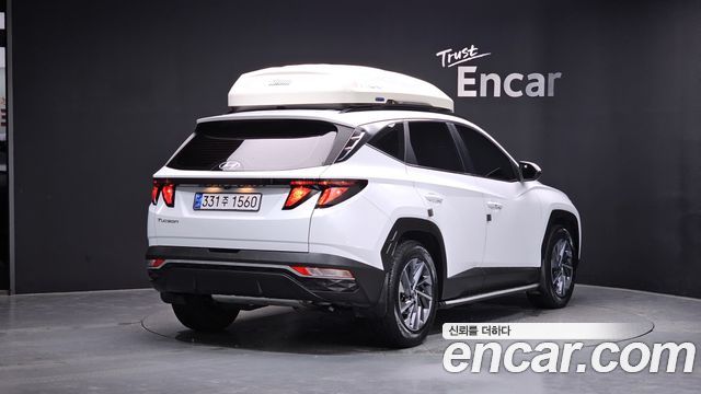 Hyundai Tucson NX4, гибрид Premium 2WD - фото 1