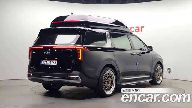 Kia Carnival Новый 4-го поколения HEV 9-Seater Hi-Limousine Signature - фото 1