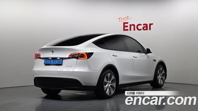 Tesla Model Y Long Range AWD - фото 1