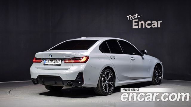 BMW 3-Series G20 320i M Sport - фото 1