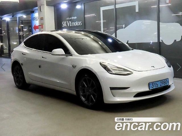 Tesla Model 3 Long Range AWD - фото 0