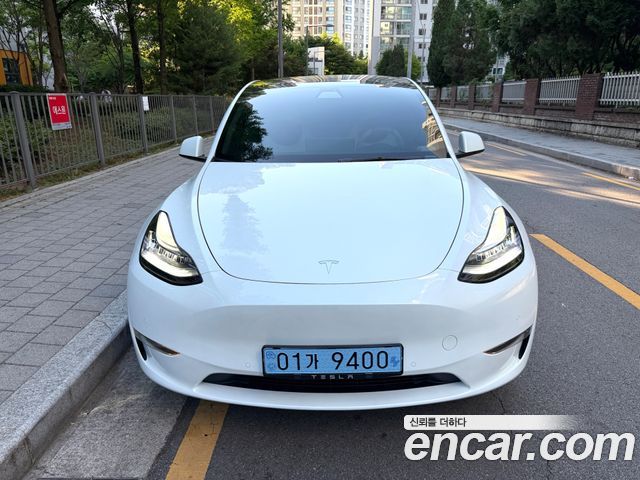 Tesla Model Y Long Range AWD - фото 1