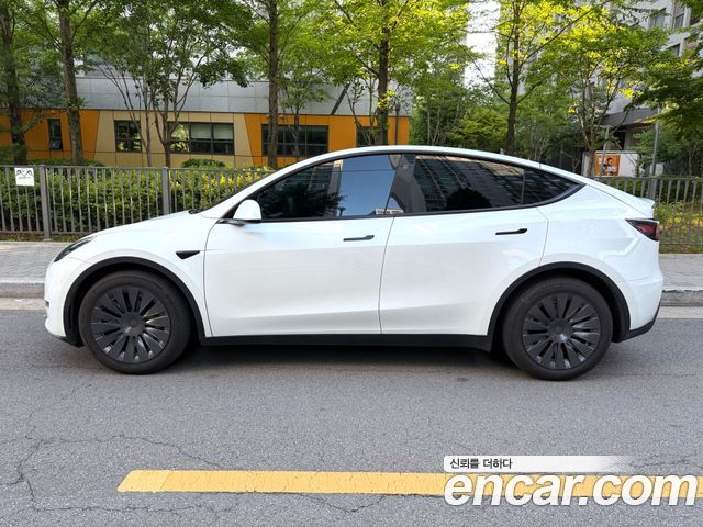 Tesla Model Y Long Range AWD - фото 2