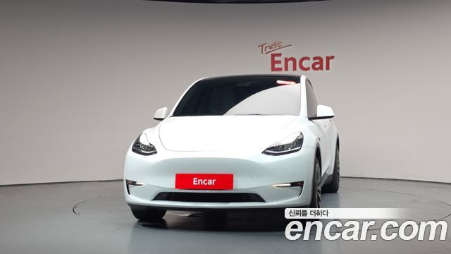 Tesla Model Y Long Range AWD - фото 1