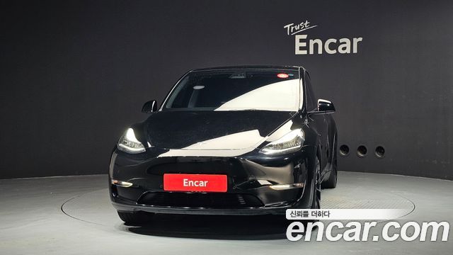 Tesla Model Y Standard Range RWD - фото 2