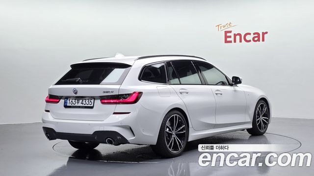 BMW 3-Series G20 320i Touring M Sports - фото 1
