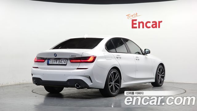 BMW 3-Series G20 320i M Sport - фото 1