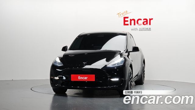Tesla Model Y Long Range AWD - фото 2