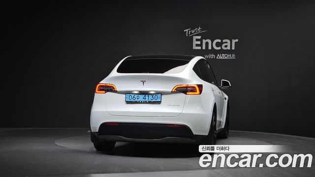 Tesla Model Y Long Range AWD - фото 2
