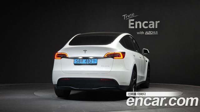 Tesla Model Y Long Range AWD - фото 2