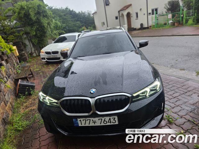 BMW 3 Series G20 320i Touring - фото 0