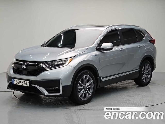 Honda CR-V 5-го поколения 2.0 Hybrid Touring 4WD - фото 0