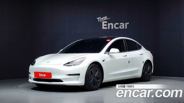 Tesla Model 3 Standard Range Plue RWD - фото 0