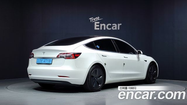 Tesla Model 3 Standard Range Plue RWD - фото 1