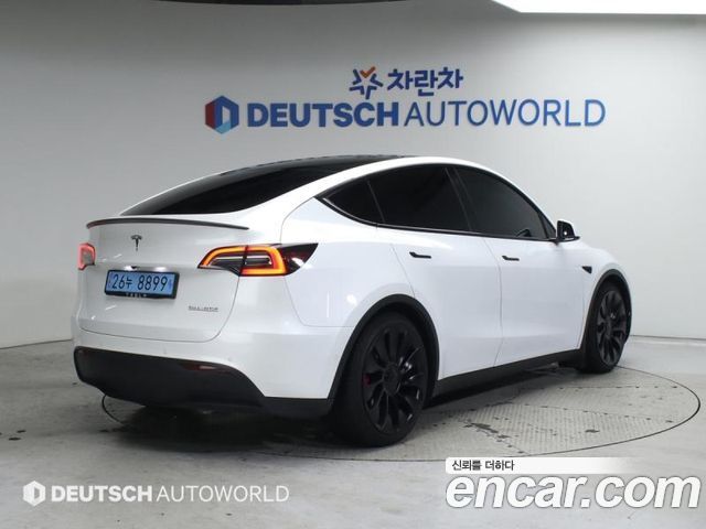 Tesla Model Y Performance AWD - фото 1