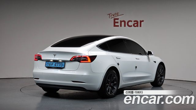 Tesla Model 3 Standard Range Plue RWD - фото 0