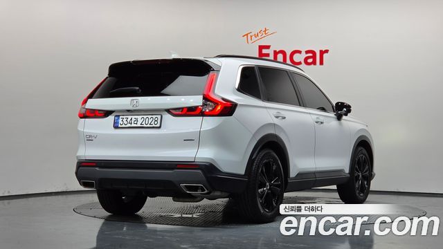 Honda CR-V 6-го поколения 2.0 Hybrid Touring 2WD - фото 1