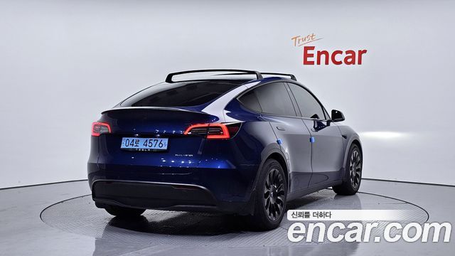 Tesla Model Y Long Range AWD - фото 1