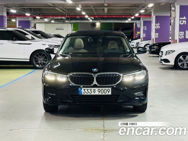BMW 3-Series G20 330e - фото 0