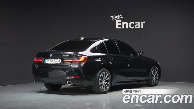 BMW 3-Series G20 320i - фото 1