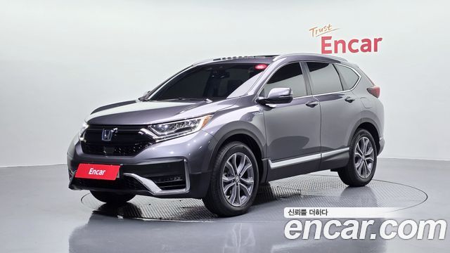 Honda CR-V 5-го поколения 2.0 Hybrid Touring 4WD - фото 0