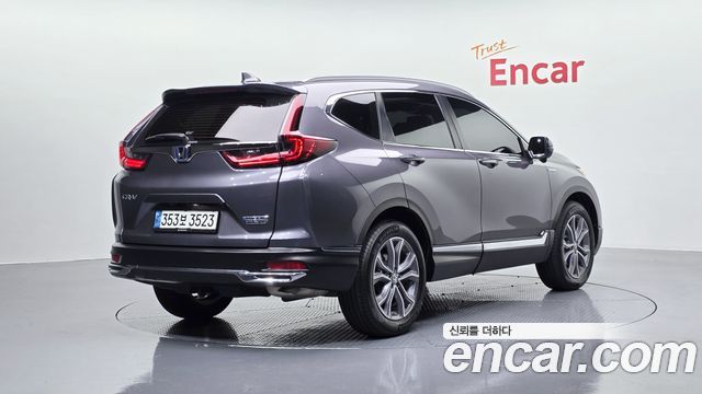 Honda CR-V 5-го поколения 2.0 Hybrid Touring 4WD - фото 1