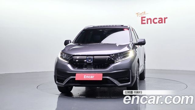 Honda CR-V 5-го поколения 2.0 Hybrid Touring 4WD - фото 2
