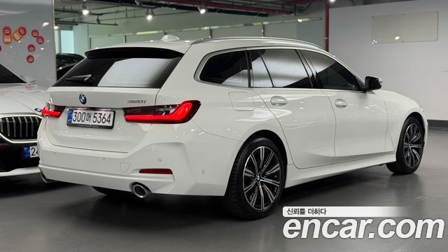 BMW 3-Series G20 320i Touring - фото 1