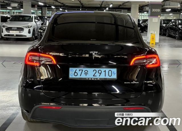 Tesla Model Y Long Range AWD - фото 4