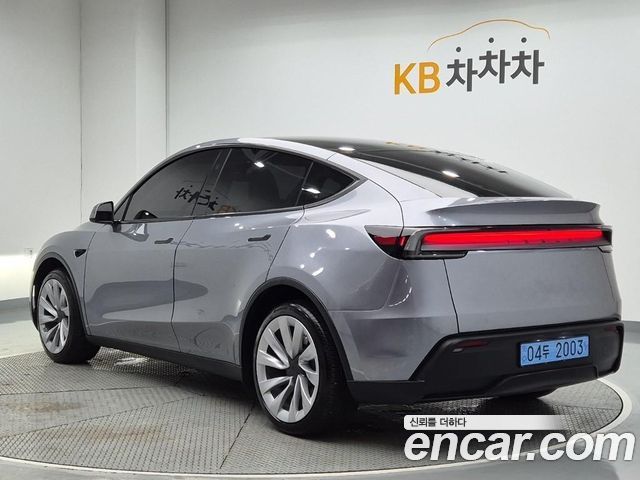 Tesla Model Y Long Range AWD - фото 1