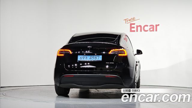 Tesla Model Y Long Range AWD - фото 3
