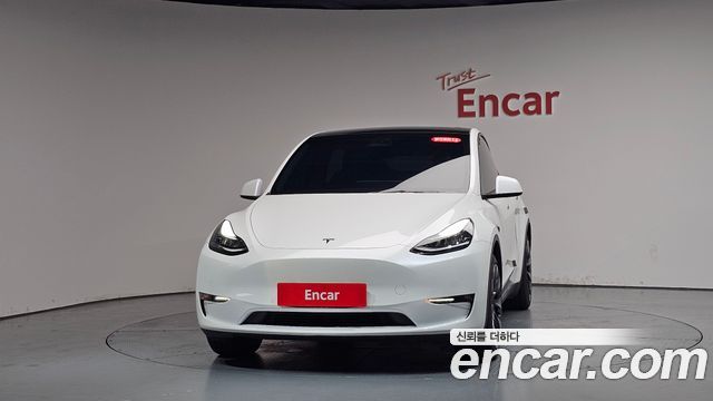 Tesla Model Y Long Range AWD - фото 1