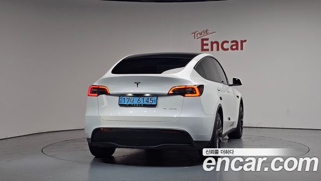 Tesla Model Y Long Range AWD - фото 2