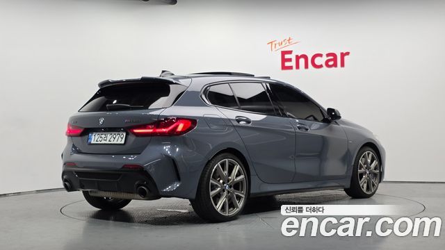 BMW 1-Series F40 M135i xDrive - фото 0