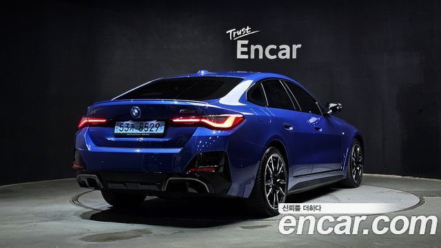 BMW i4 M50 - фото 1