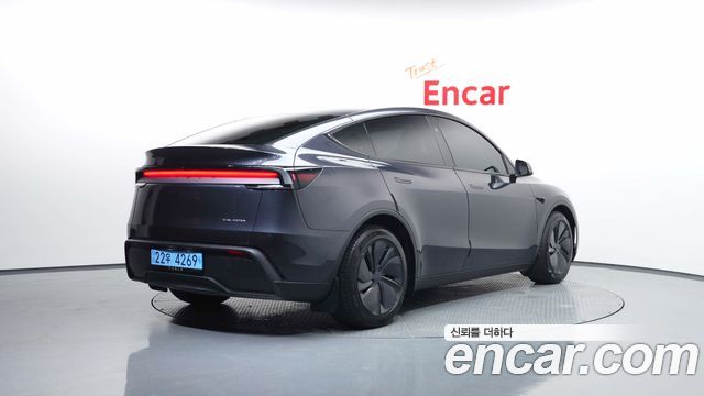 Tesla Model Y Long Range AWD - фото 1