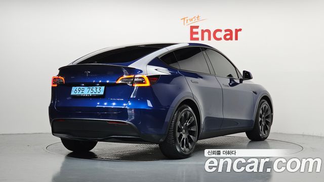 Tesla Model Y Long Range AWD - фото 1