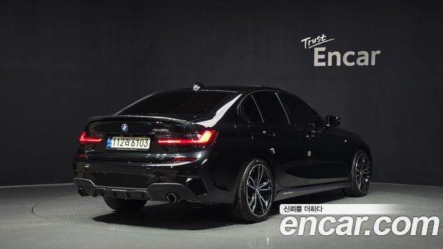 BMW 3-Series G20 330i M Sport - фото 1